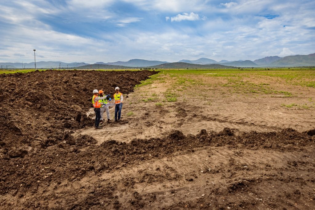 Amandelbult - Open Pit Rehabilitation. L to R are Abram Mosothoane (Site manager - Zizwe), Edgar Chandomba (Production Manager - Anglo)and Bongani Phakathi (Senior Foreman - Zizwe)